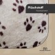 Eine Nahaufnahme eines weichen, plüschigen Stoffes mit einem hellbeigen Hintergrund und dunklen Pfotenabdrücken. Text lautet "Plüschstoff" und "Flauschig & weich."