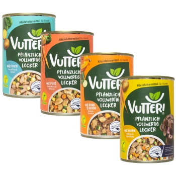 Vier Dosen Vutter Hundefutter, gekennzeichnet als vegan und pflanzenbasiert, mit den Geschmacksrichtungen: Fisch, Truthahn, Rind & Huhn und Huhn.
