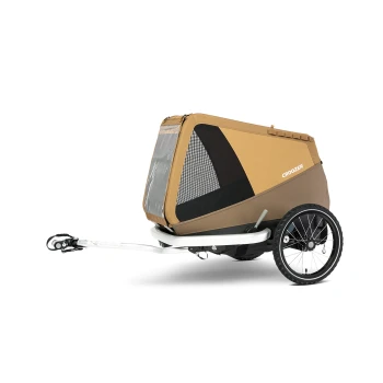 Ein brauner Haustieranhänger mit einem Netz vorne und seitlichen Paneelen, mit einem weißen Rahmen und Rad, beschriftet mit "CROOZER."