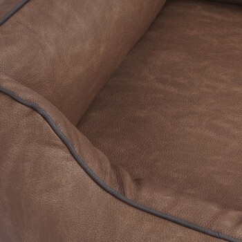 Braunes Haustierbett mit einer strukturierten lederähnlichen Oberfläche und einem gepolsterten Rand, entworfen für Komfort und Stil.