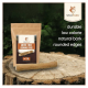 Wildfang Coffee Tree Kaustick-Paket auf einer Holzoberfläche, mit dem Text: "haltbar, kalorienarm, natürliche Rinde, abgerundete Kanten."