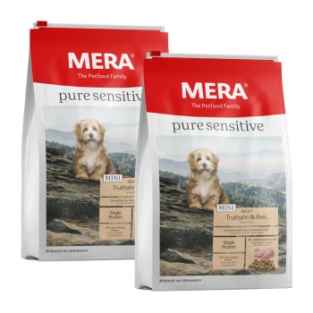 Zwei Taschen MERA pure sensitive Hundefutter für Mini-Erwachsene, mit einem Hund auf der Vorderseite, beschriftet 'Truthahn & Reis'.