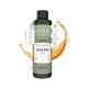 Flasche Alphazoo Alpha-Barf Haustierfutteröl mit Spritzern, gekennzeichnet als natürlich, fachmännisch entwickelt und ohne Zusatzstoffe.