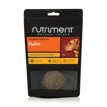 Schwarze Nutriment Natural Treats-Tüte mit Aufschrift 'Gourmet-Burgers Huhn', Hunde-Kopf-Abbildung und sichtbarem rundem Burger-Leckerli.