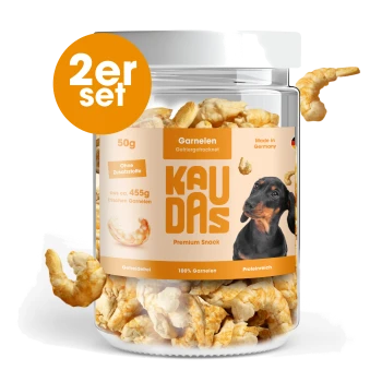 Ein Glas mit Garnelen-Hundeleckerlis, beschriftet mit 'KAUDAS' und einem Dackelbild, mit dem Text 'Training & Belohnung', '100% Fleisch' und 'Hergestellt in Deutschland.'
