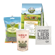 Eine Bellfor-Hundefutterkollektion mit "Landgut-Happi" Leckereien, "Landgut-Schmaus" Trockenfutter, "Shiimun Slim" Ergänzung und einer Tragetasche.