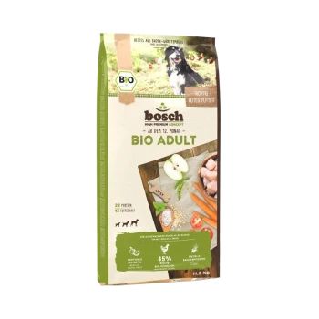 Sac de nourriture pour chiens Bosch Bio Adult, 11,5 kg, présentant un chien noir sur le devant, avec des ingrédients comme du poulet, des pommes et des carottes.