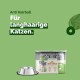 Anti-Haarball-Katzenfutter für langhaarige Katzen, das ein Multipack mit Rind und Huhn enthält, präsentiert mit einer Metallfutterschüssel.