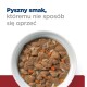 Miska z karmą dla zwierząt z kawałkami mięsa i warzyw w sosie, z napisem "Pyszny smak, któremu nie sposób się oprzeć" powyżej.