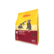 Kartonbox mit mehreren Tüten JOSI DOG Regular Adult Hundefutter, gekennzeichnet als Wertpaket von 4,5 kg, mit Bildern von Hunden.