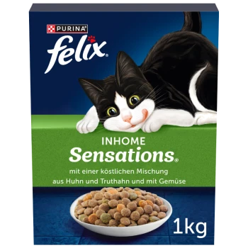 Une boîte de 1 kg de nourriture pour chats Purina Felix avec un chat noir et blanc joueur, étiquetée "INHOME Sensations®" avec du poulet, de la dinde et des légumes.