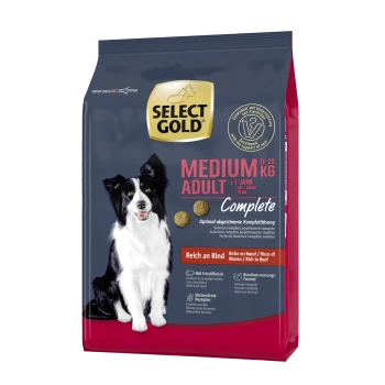 Select Gold Hundefuttertüte mit einem schwarz-weißen Hund, beschriftet mit "MEDIUM ADULT" für Hunde von 11-25 kg, mit Rindfleisch als Hauptzutat.