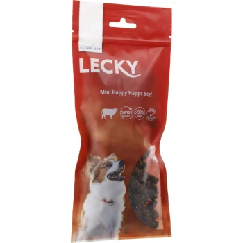 Un emballage rouge pour les friandises pour chiens Lecky Mini Happy Happs au bœuf présentant un chien heureux sur le devant, avec un texte indiquant "Qualité Suisse" et "93% Viande."