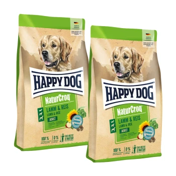 Zwei Beutel Happy Dog NaturCroq Lamm & Reis Hundefutter für erwachsene Hunde mit Bild eines Golden Retrievers und deutschem Text.