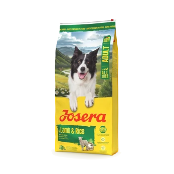 Josera Hundefutterbeutel für erwachsene Hunde mit Lamm und Reis, zeigt einen glücklichen schwarz-weißen Hund und Berglandschaft.
