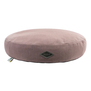 Runde Haustierliege aus weichem rosa Stoff mit strukturierter Oberfläche, mit einem kleinen schwarzen Jeggo-Logo an der Seite.
