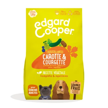 Emballage de nourriture pour chiens "Edgard Cooper" avec un fond jaune, présentant "Croustillantes Carotte & Courgette" pour chiens adultes.
