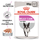Emballage de nourriture pour chiens Royal Canin Relax Care, avec une illustration de chien courant, étiqueté "85g x 12", avec "Care Nutrition" et "Toutes tailles."