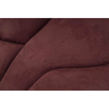 Nahaufnahme eines weichen, burgunderfarbenen Haustierbettstoffs mit glatten, geschwungenen Mustern.