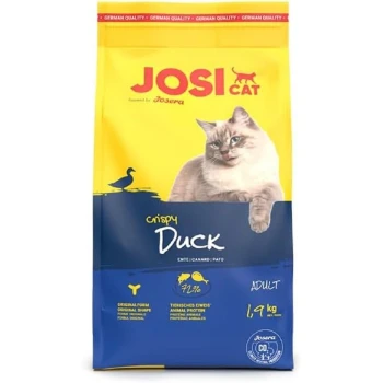 Gelbe Tüte JOSI CAT knuspriges Entenfutter für Katzen, mit einem Bild einer flauschigen Katze, mit Text, der 72% tierisches Protein und ein Gewicht von 1,9 kg hervorhebt.