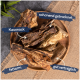 Getrocknete Hundekauartikel auf einem Holztablett, beschriftet mit 'Kausnack', 'schonend getrocknet', 'fettarm' und 'gut verträglich'.