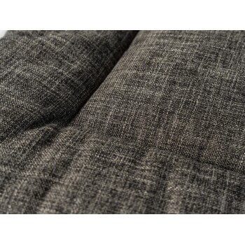 Nahaufnahme eines strukturierten grauen Haustierbettstoffs, der ein weiches, gewebtes Muster zeigt, ideal für den Komfort von Haustieren.