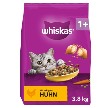 Sac de nourriture Whiskas violet avec un chat regardant par-dessus un bol de croquettes ; texte visible : whiskas, 1+, Mit saftigem Huhn, 3,8 kg.