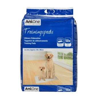 Packung mit AniOne Training Pads mit zwei Labrador-Welpen auf einem Pad, mit den Maßen 60x90 cm und 50 Pads enthalten.