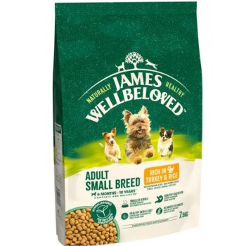 Bag of James Wellbeloved dog food for adult small breeds, featuring a green design, images of dogs, and text highlighting turkey and rice ingredients.