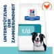 Hill's Prescription Diet t/d Hundefutterbeutel mit einem lächelnden schwarz-weißen Hund, mit dem Text "Unterstützung der Zahngesundheit."