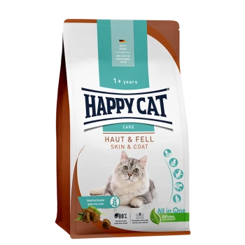 Happy Cat Care Trockenfutterbeutel für Katzen, mit der Aufschrift "Haut & Fell Skin & Coat", geeignet für Katzen ab 1 Jahr, mit einer flauschigen grauen Katze auf der Vorderseite.