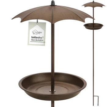 Ein bronzefarbener Vogelfutterspender mit einem Regenschirmdesign, der eine runde Futterplatte und ein Etikett mit der Aufschrift "wildlife home Inklusive Steckstab" hat.