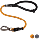 Eine lebendige orange-graue geflochtene Hundeleine mit einem schwarzen Griff, beschriftet mit "Floxik" und einem Metallclip zur Befestigung.