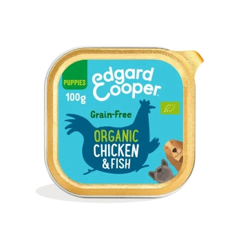 Nourriture humide pour chiots à base de poulet et de poisson, 100g, sans céréales, avec un fond bleu illustré d'un poulet et d'icônes d'animaux.
