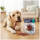Gelber Labrador kaut an einem Fleischstreifen neben einer Tüte mit der Aufschrift 'PREMIERE I ♥ my dog' 'Meat Snack Strips (280 g)'.
