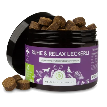 Behälter mit "Ruhe & Relax Leckerli" Hundeleckereien, mit einem lila Etikett, das anzeigt, dass es sich um ein Nahrungsergänzungsmittel für Hunde handelt, 300g.
