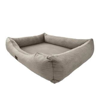 Ein gemütliches, rechteckiges Haustierbett mit einem weichen, gerippten Stoff in hellbeige, mit erhöhten Rändern für Komfort.