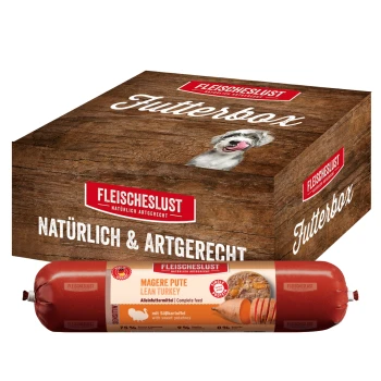 Fleischeslust Futterbox Hundefutterbox mit Hundebild und einer Packung magerer Pute mit Süßkartoffeln als Vollnahrung.