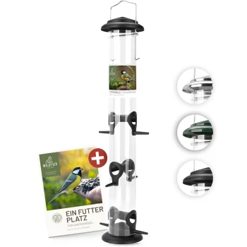 Futtersäule für Samen, Körner & Kerne 52cm, Schwarz Ein transparenter Vogelhäuschen mit einem schwarzen Deckel und mehreren Futteröffnungen, begleitet von einem Werbebroschüre mit dem Titel 'Ein Futter Platz für Gartenvögel.'