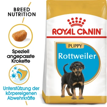 Royal Canin Rottweiler Welpenfutterbeutel mit einer Illustration eines Rottweiler-Welpen, mit Text, der die Ernährung und die Immununterstützung der Rasse hervorhebt.