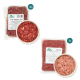 Rohfutterpakete für Haustiere mit Rentier- und Hühnerfleisch, wobei eine Schüssel jeder Art angezeigt wird; Etiketten enthalten Gewicht und Marke.