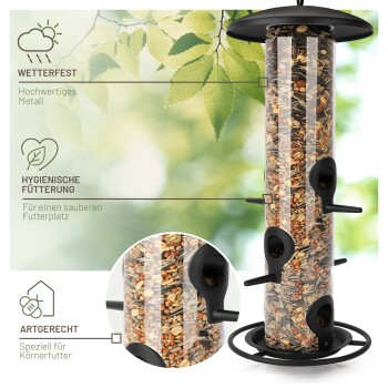 Metallvogelhaus mit einem klaren Samenschlauch, drei Futteröffnungen und einem runden Boden. Merkmale: wetterfest, hygienisch, artgerecht.