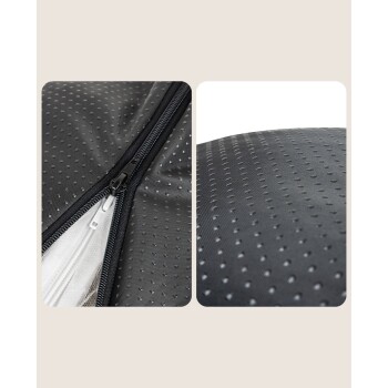 Nahaufnahme eines schwarzen Haustierbettes mit einem Reißverschluss, mit einer strukturierten Oberfläche mit kleinen Perforationen für Atmungsaktivität.