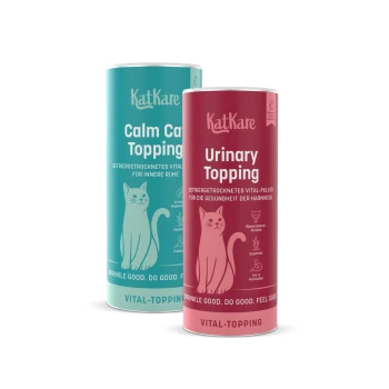 KatKare Cat Toppings: türkisfarbene 'Calm Cat Topping'-Zylinder und roter 'Urinary Topping'-Zylinder mit Katzenillustration.
