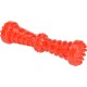 Rotes strukturiertes Gummi-Hundespielzeug mit erhabenen Noppen und Löchern, entwickelt für die Zahngesundheit.