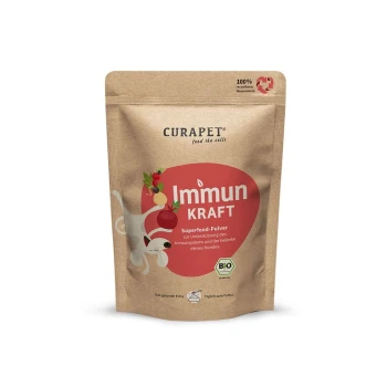 Curapet Immun Kraft Superfood-Pulver für Hunde, mit einer verspielten Hundillustration, mit Text, der die Unterstützung des Immunsystems und die Gelenkgesundheit hervorhebt.