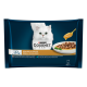 Purina Gourmet Katzenfutterverpackung zeigt eine weiße Katze, einen Teller mit Nassfutter in Sauce und einen Löffel. Text: "Genuss in Sauce" und "Régal de Sauces."