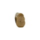 Brown compressed dog chew with paw-shaped cross-section on black background