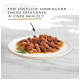 Teller mit zerrissenem Fleisch in Sauce, garniert mit Rosmarin, mit dem Text: "Eine köstliche Kombination zweier Kreationen."