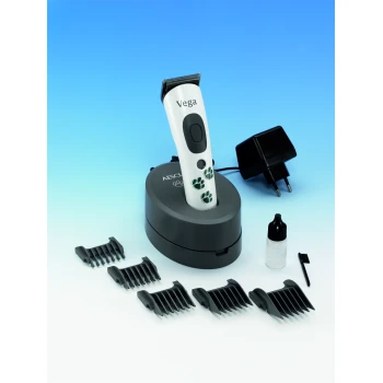 Kit de toilettage pour animaux comprenant une tondeuse Vega avec un design de patte, une base de chargement, quatre peignes, une bouteille d'huile et une brosse de nettoyage.